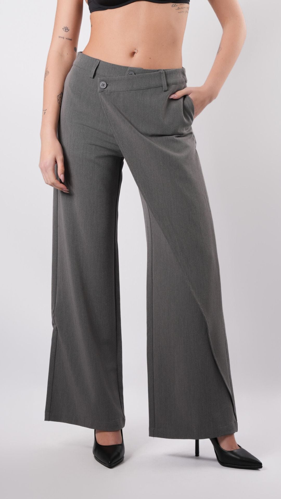 PANTALON AVEC FERMETURE DOUBLE BOUTON ASYMETRIQUE